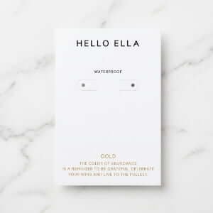 Custom 700g cardboard earring cards with two die-cut holes for studs and bracelets, featuring high-quality offset printing.