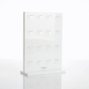 White acrylic earring display stand featuring double-sided hanging holes for studs and pendants with a sturdy detachable base.