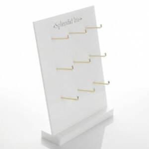 White acrylic leaning jewelry display stand with 9 gold hooks for hanging earring cards and necklaces