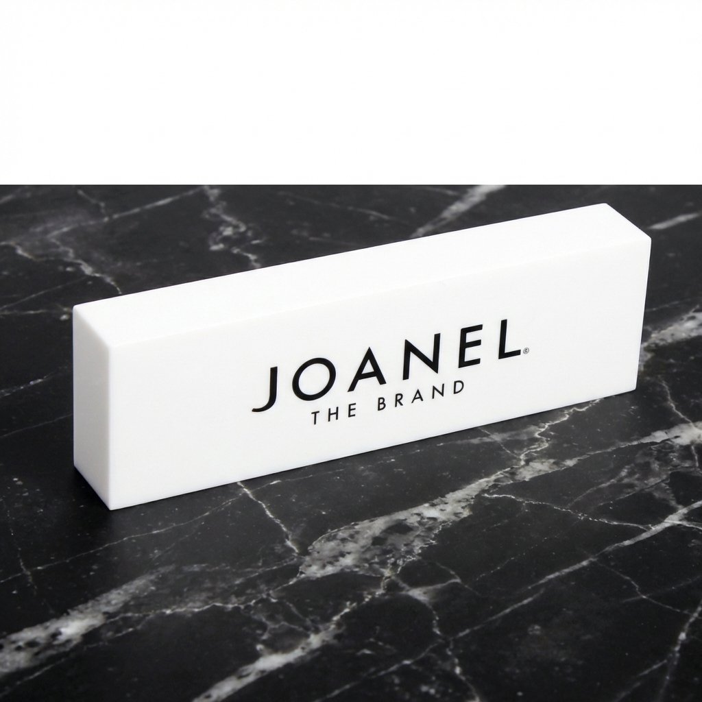 Custom white acrylic branding block with printed logo for jewelry retail counter display, 7x3.15x2 inches.